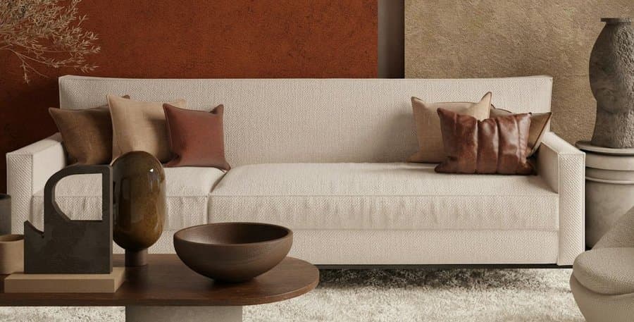 The Avio Sofa in ivory woven fabric with a low, architectural frame.